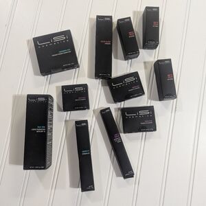 Lisi Cosmetics lot of 11 pieces Eyeshadow Lipstick Foundation Assorted Shades